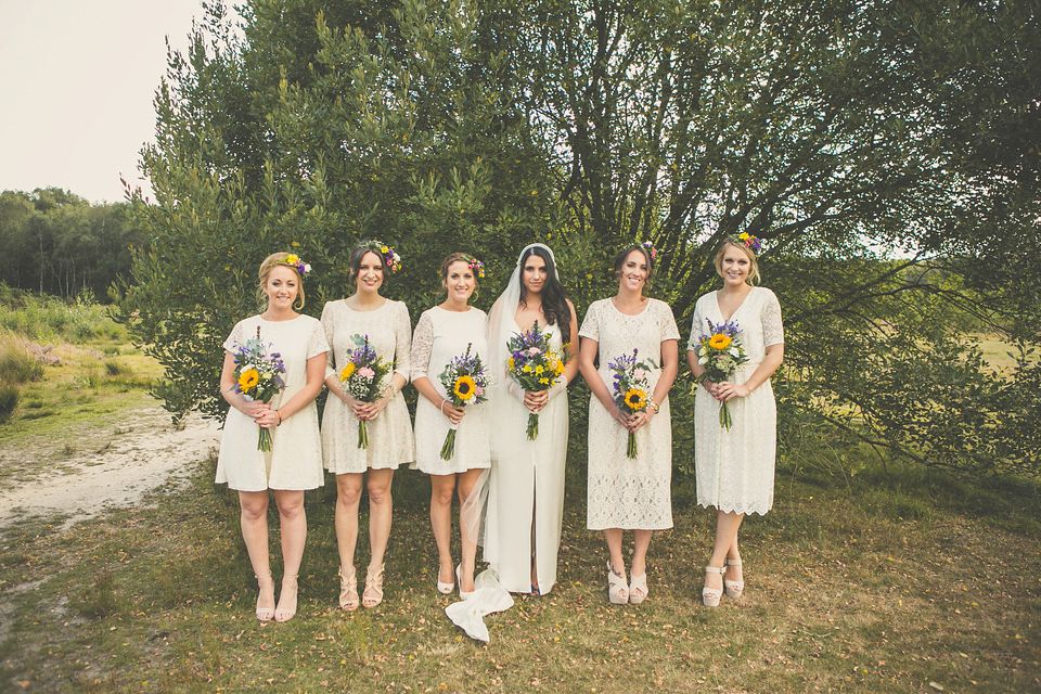 Kat wore an Oxfam wedding dress for her laid back and homemade wedding in her Mum's back garden. Photography by India Hobson.