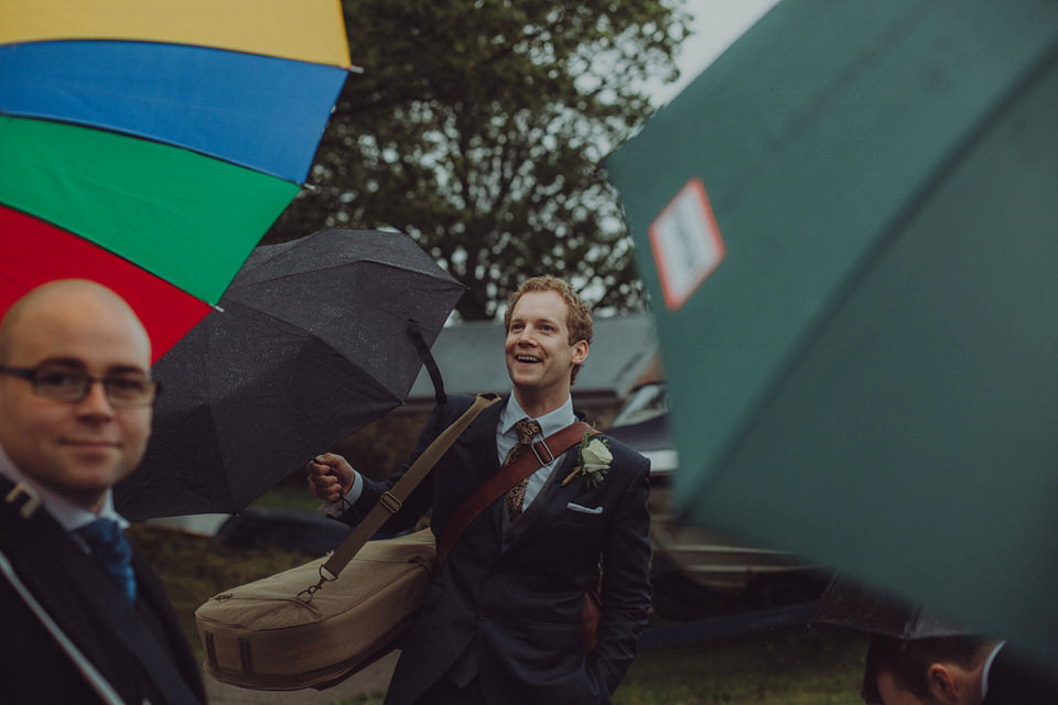 Victoria wore an alternative ballgown style dress by Aftershock for her intimate, outdoor, rainy day wedding in Scotland. Images by Drawing Room Photography.