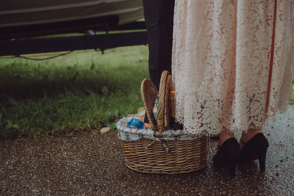 Victoria wore an alternative ballgown style dress by Aftershock for her intimate, outdoor, rainy day wedding in Scotland. Images by Drawing Room Photography.