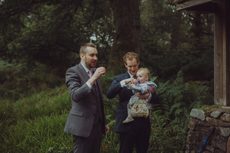 Victoria wore an alternative ballgown style dress by Aftershock for her intimate, outdoor, rainy day wedding in Scotland. Images by Drawing Room Photography.