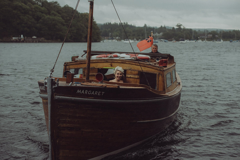 Victoria wore an alternative ballgown style dress by Aftershock for her intimate, outdoor, rainy day wedding in Scotland. Images by Drawing Room Photography.