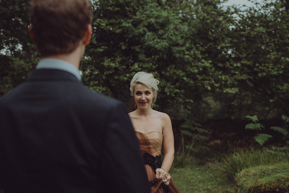 Victoria wore an alternative ballgown style dress by Aftershock for her intimate, outdoor, rainy day wedding in Scotland. Images by Drawing Room Photography.