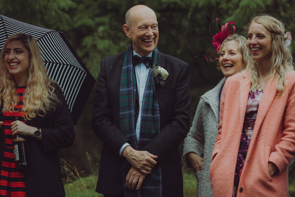 Victoria wore an alternative ballgown style dress by Aftershock for her intimate, outdoor, rainy day wedding in Scotland. Images by Drawing Room Photography.