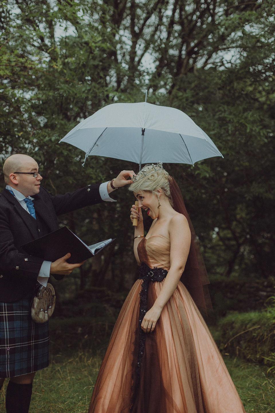 Victoria wore an alternative ballgown style dress by Aftershock for her intimate, outdoor, rainy day wedding in Scotland. Images by Drawing Room Photography.