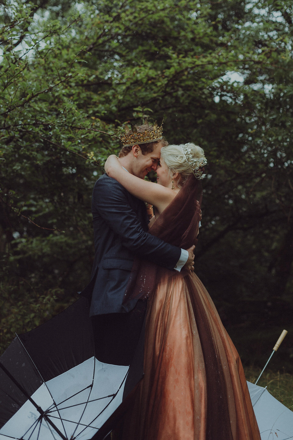 Victoria wore an alternative ballgown style dress by Aftershock for her intimate, outdoor, rainy day wedding in Scotland. Images by Drawing Room Photography.