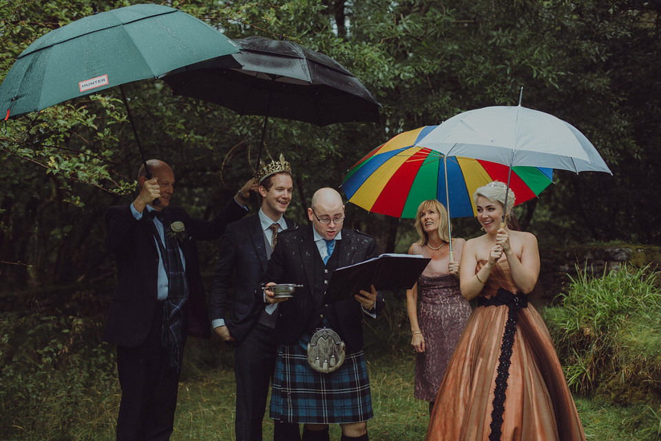 Victoria wore an alternative ballgown style dress by Aftershock for her intimate, outdoor, rainy day wedding in Scotland. Images by Drawing Room Photography.