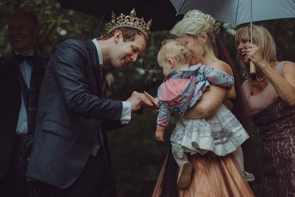 Victoria wore an alternative ballgown style dress by Aftershock for her intimate, outdoor, rainy day wedding in Scotland. Images by Drawing Room Photography.