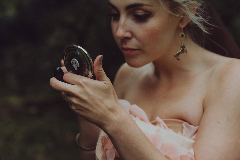 Victoria wore an alternative ballgown style dress by Aftershock for her intimate, outdoor, rainy day wedding in Scotland. Images by Drawing Room Photography.