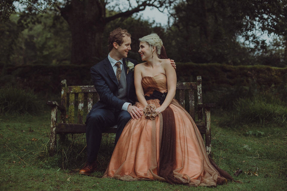 Victoria wore an alternative ballgown style dress by Aftershock for her intimate, outdoor, rainy day wedding in Scotland. Images by Drawing Room Photography.