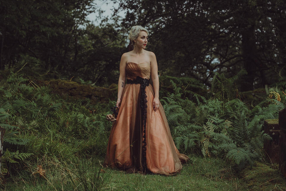 Victoria wore an alternative ballgown style dress by Aftershock for her intimate, outdoor, rainy day wedding in Scotland. Images by Drawing Room Photography.