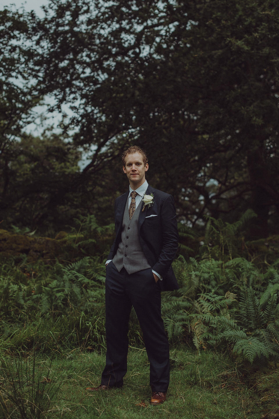 Victoria wore an alternative ballgown style dress by Aftershock for her intimate, outdoor, rainy day wedding in Scotland. Images by Drawing Room Photography.