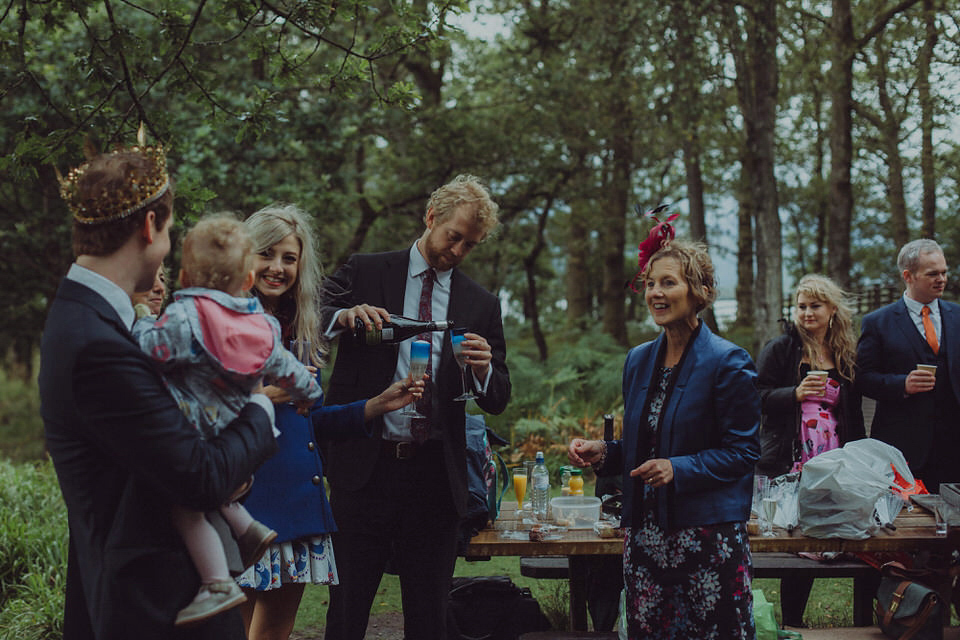 Victoria wore an alternative ballgown style dress by Aftershock for her intimate, outdoor, rainy day wedding in Scotland. Images by Drawing Room Photography.