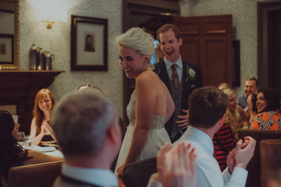 Victoria wore an alternative ballgown style dress by Aftershock for her intimate, outdoor, rainy day wedding in Scotland. Images by Drawing Room Photography.