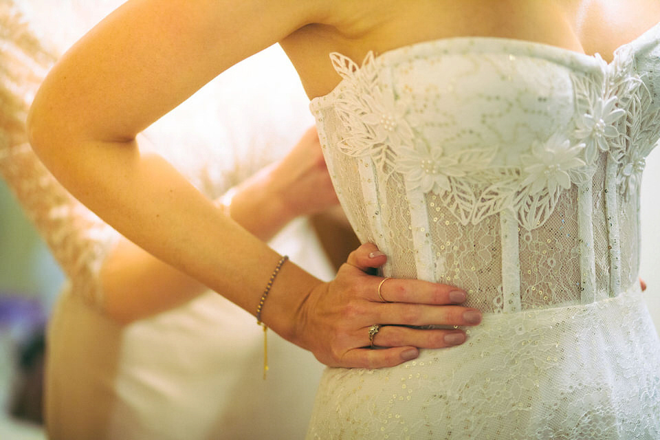 Lou wore a Kobus Dippenaar gown for her glamorous Tudor Manor house wedding. Photography by Joseph Hall.