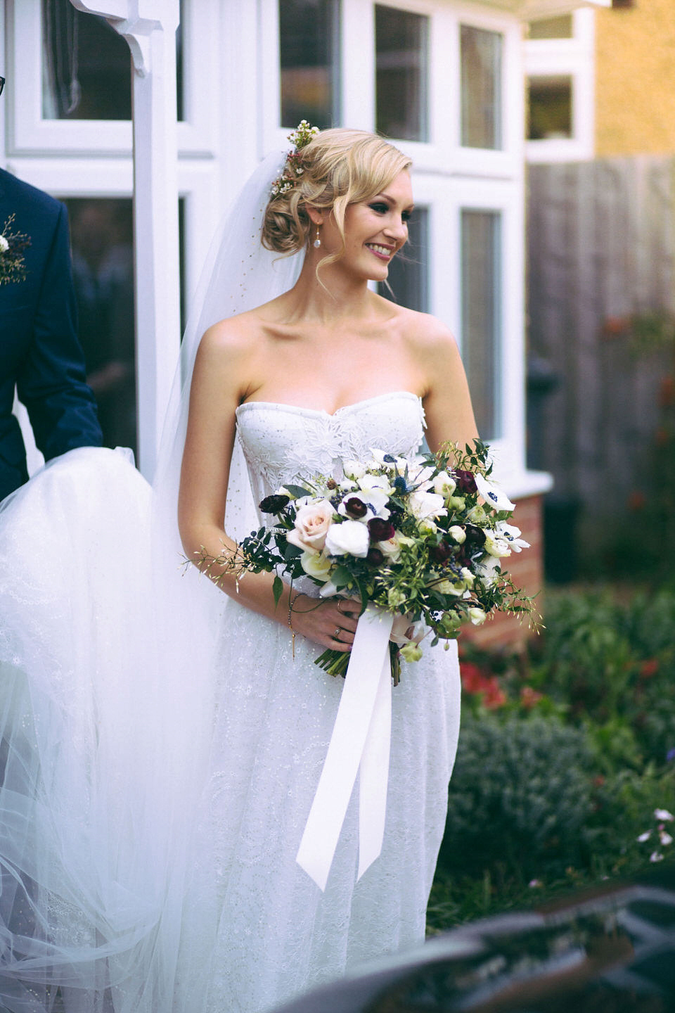 Lou wore a Kobus Dippenaar gown for her glamorous Tudor Manor house wedding. Photography by Joseph Hall.