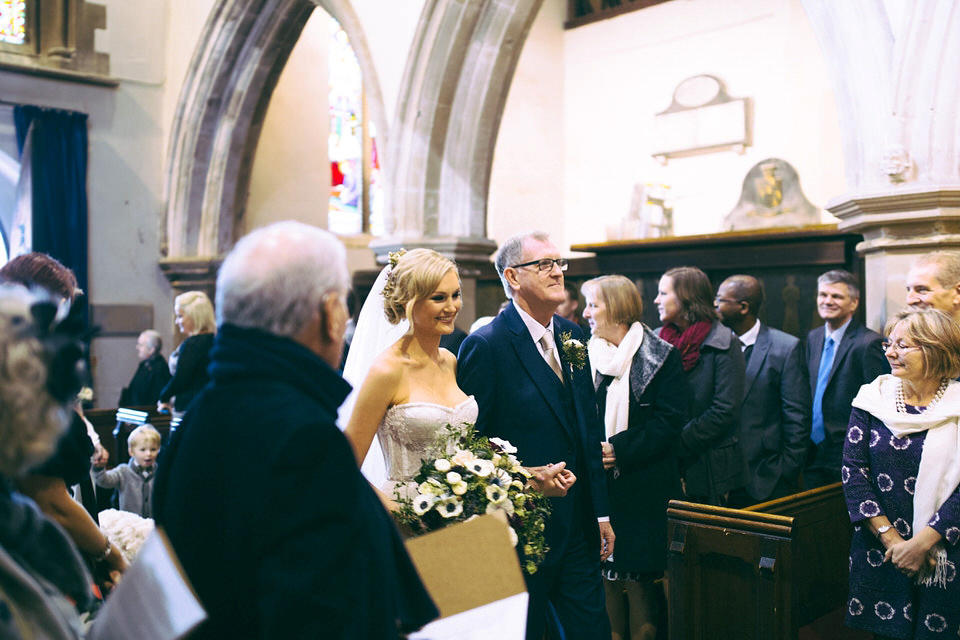 Lou wore a Kobus Dippenaar gown for her glamorous Tudor Manor house wedding. Photography by Joseph Hall.