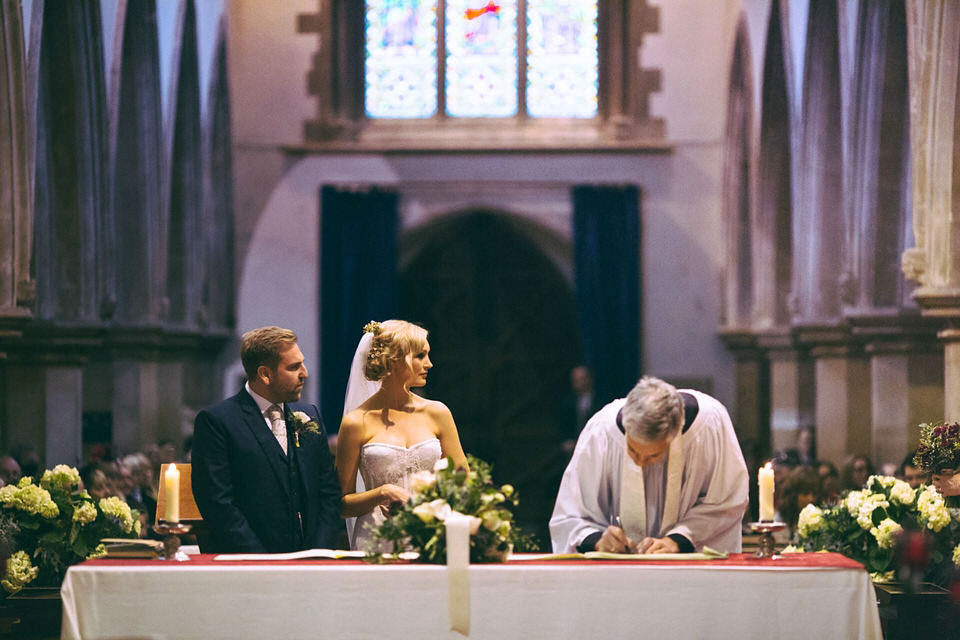 Lou wore a Kobus Dippenaar gown for her glamorous Tudor Manor house wedding. Photography by Joseph Hall.