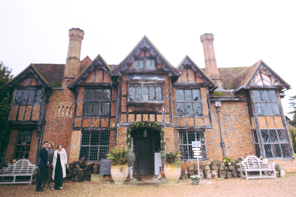 Lou wore a Kobus Dippenaar gown for her glamorous Tudor Manor house wedding. Photography by Joseph Hall.