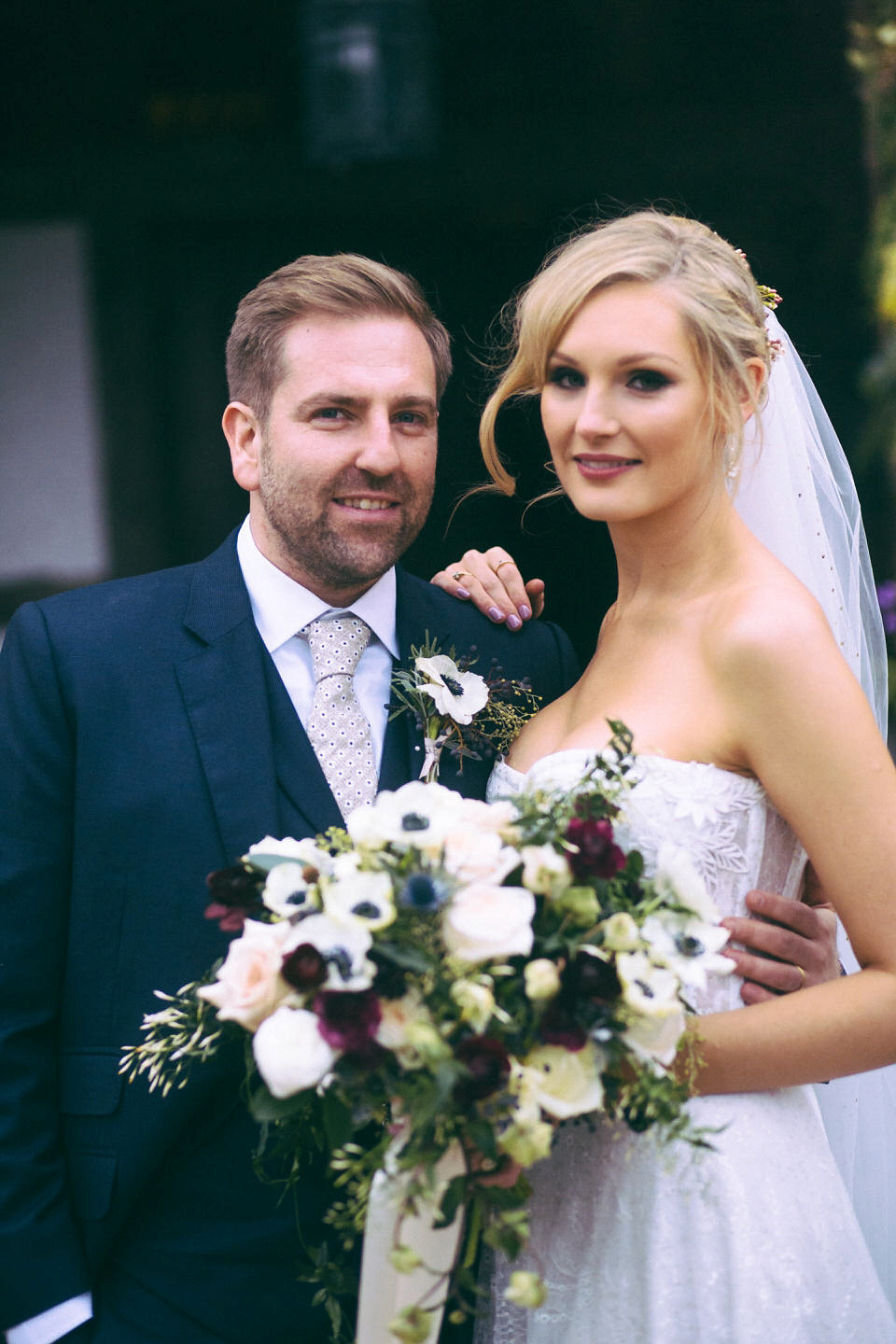 Lou wore a Kobus Dippenaar gown for her glamorous Tudor Manor house wedding. Photography by Joseph Hall.