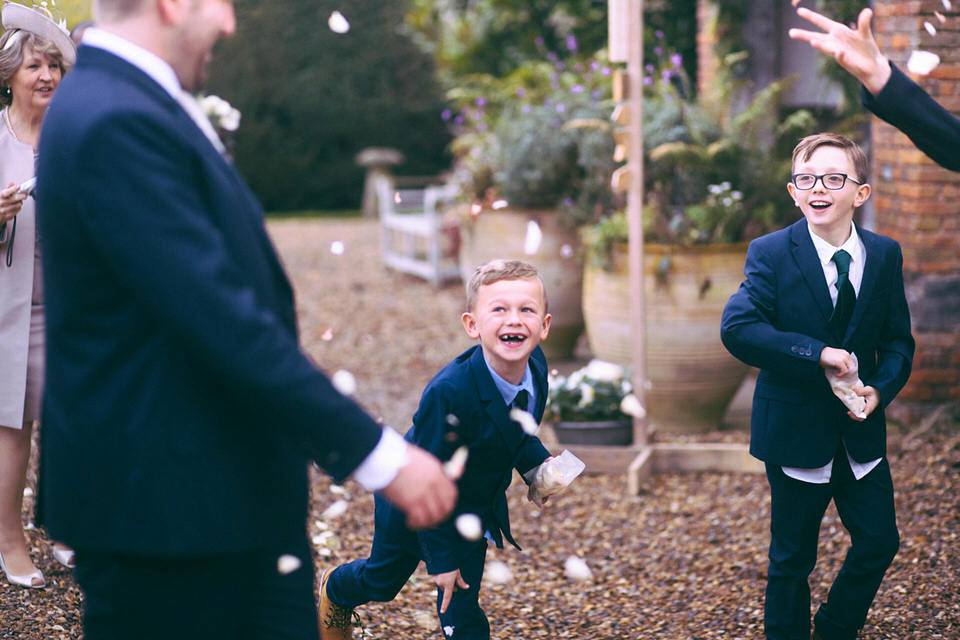 Lou wore a Kobus Dippenaar gown for her glamorous Tudor Manor house wedding. Photography by Joseph Hall.