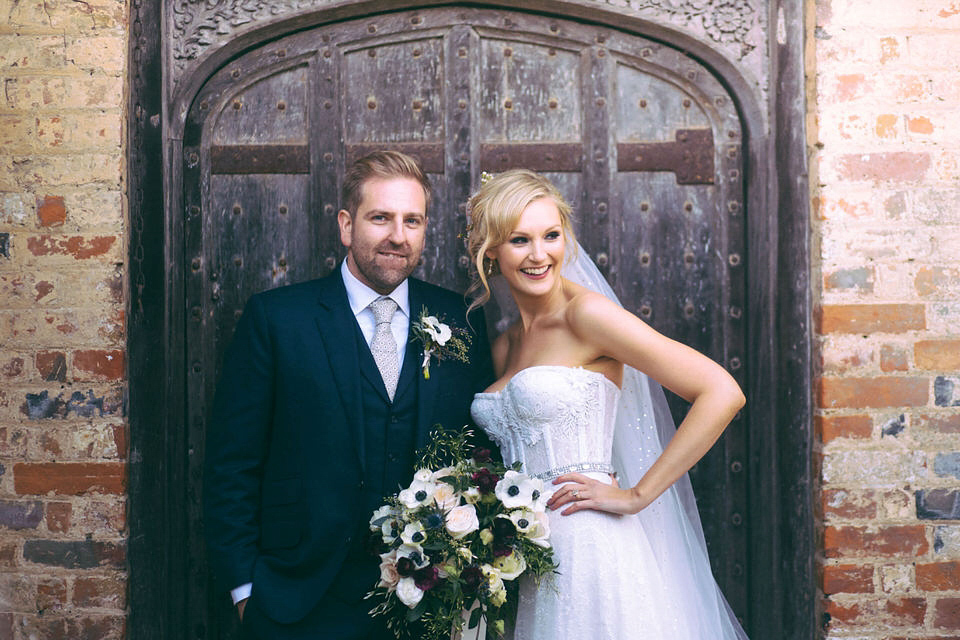 Lou wore a Kobus Dippenaar gown for her glamorous Tudor Manor house wedding. Photography by Joseph Hall.