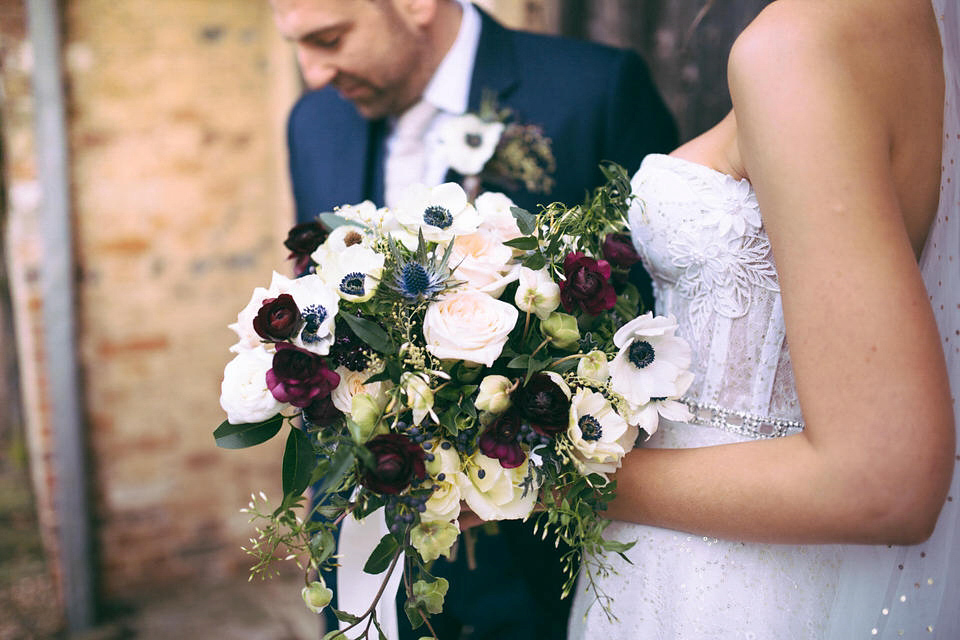 Lou wore a Kobus Dippenaar gown for her glamorous Tudor Manor house wedding. Photography by Joseph Hall.