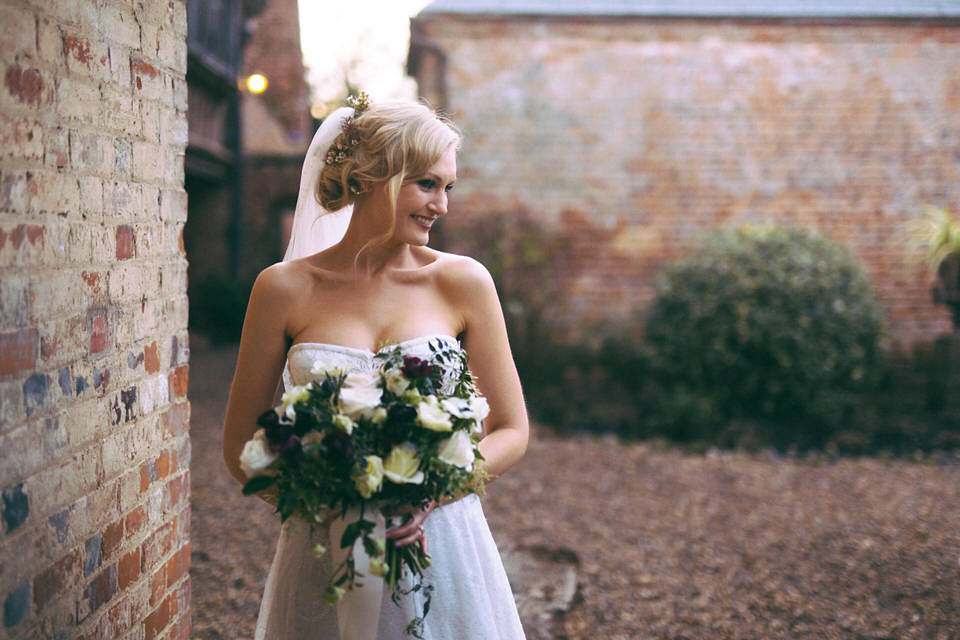 Lou wore a Kobus Dippenaar gown for her glamorous Tudor Manor house wedding. Photography by Joseph Hall.