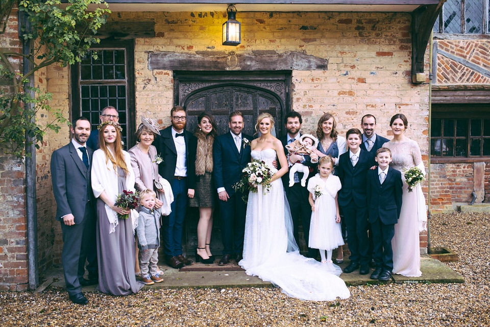 Lou wore a Kobus Dippenaar gown for her glamorous Tudor Manor house wedding. Photography by Joseph Hall.