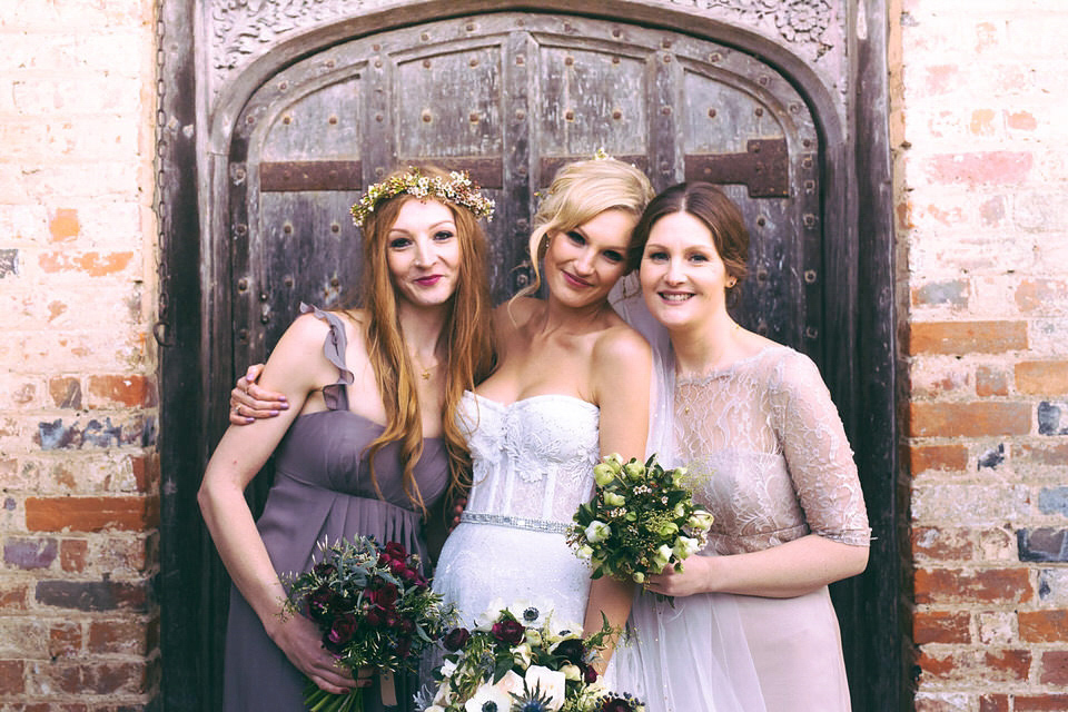 Lou wore a Kobus Dippenaar gown for her glamorous Tudor Manor house wedding. Photography by Joseph Hall.