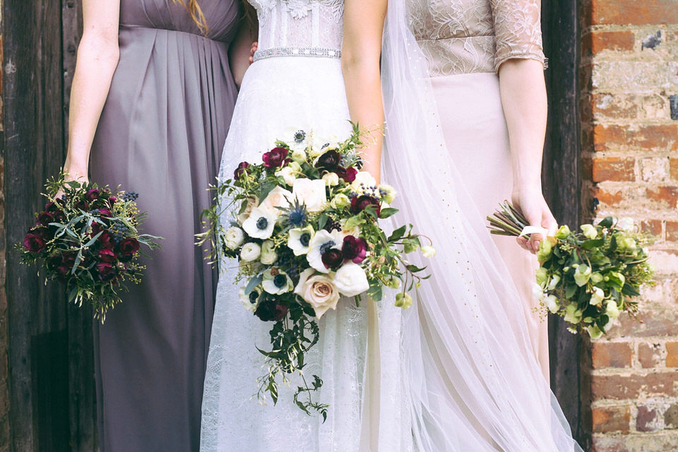 Lou wore a Kobus Dippenaar gown for her glamorous Tudor Manor house wedding. Photography by Joseph Hall.