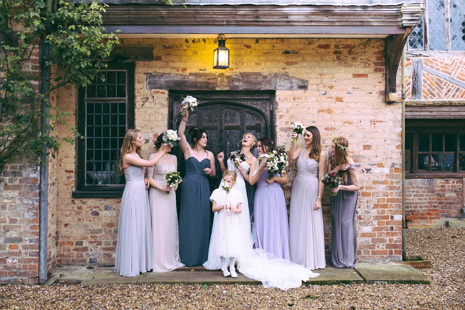 Lou wore a Kobus Dippenaar gown for her glamorous Tudor Manor house wedding. Photography by Joseph Hall.