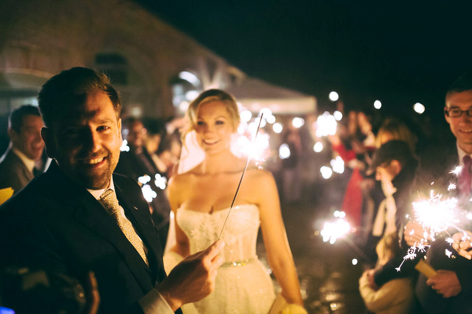 Lou wore a Kobus Dippenaar gown for her glamorous Tudor Manor house wedding. Photography by Joseph Hall.