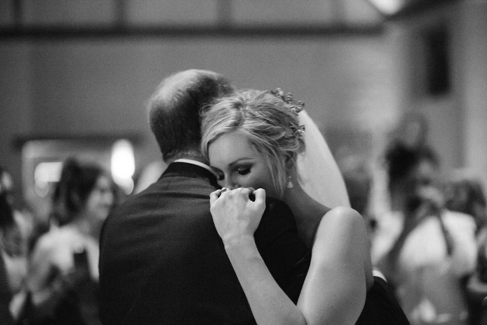 Lou wore a Kobus Dippenaar gown for her glamorous Tudor Manor house wedding. Photography by Joseph Hall.