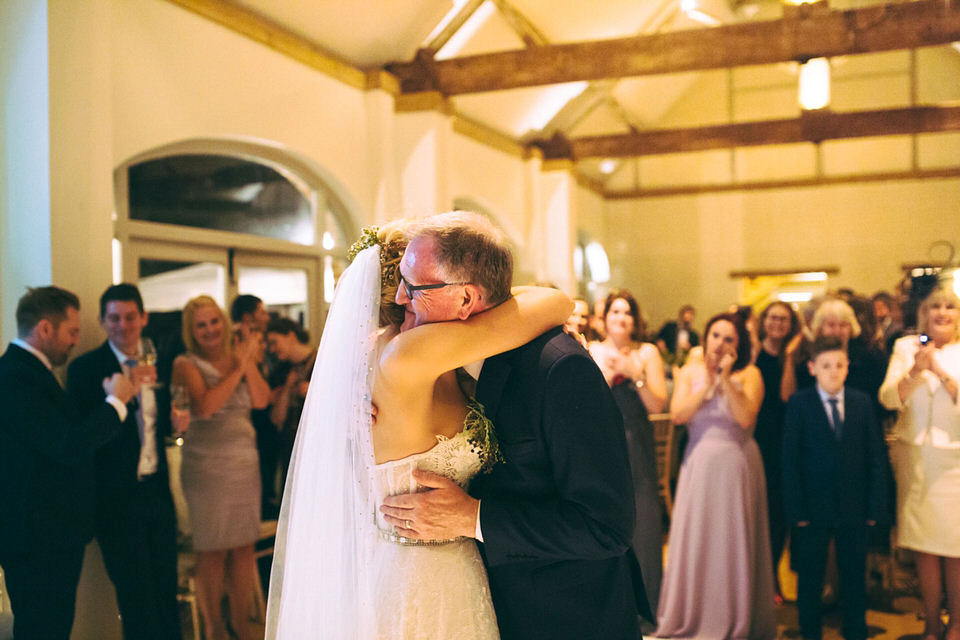 Lou wore a Kobus Dippenaar gown for her glamorous Tudor Manor house wedding. Photography by Joseph Hall.