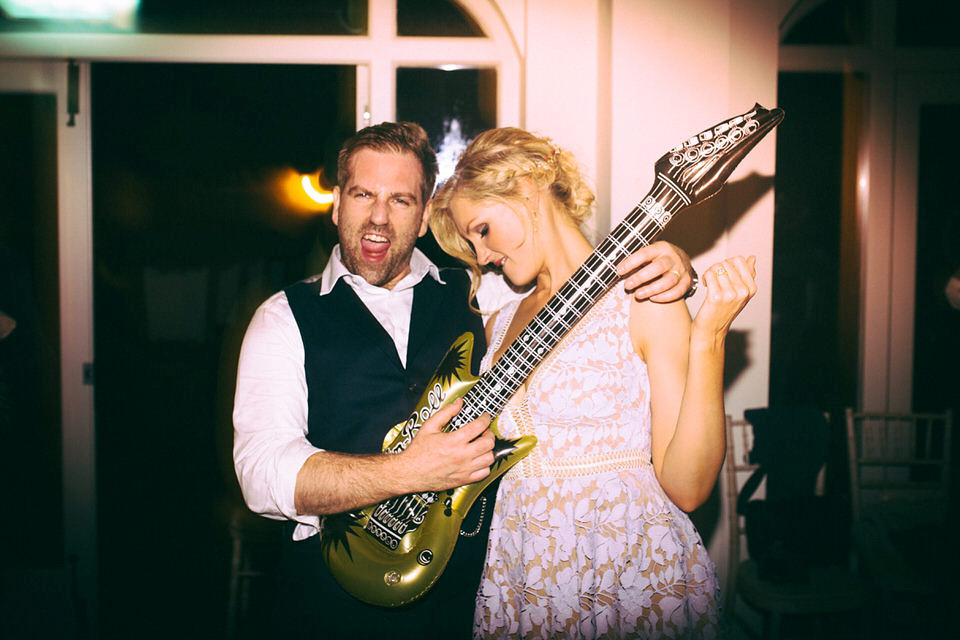 Lou wore a Kobus Dippenaar gown for her glamorous Tudor Manor house wedding. Photography by Joseph Hall.