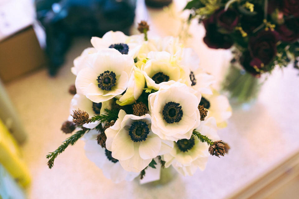 Lou wore a Kobus Dippenaar gown for her glamorous Tudor Manor house wedding. Photography by Joseph Hall.