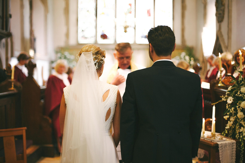 A cut-out dress made by the bride for her modern monochrome and Art Deco inspired wedding. Photography by Naomi Fowler.