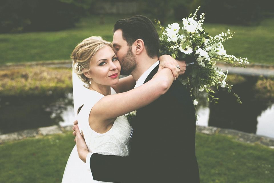 A cut-out dress made by the bride for her modern monochrome and Art Deco inspired wedding. Photography by Naomi Fowler.