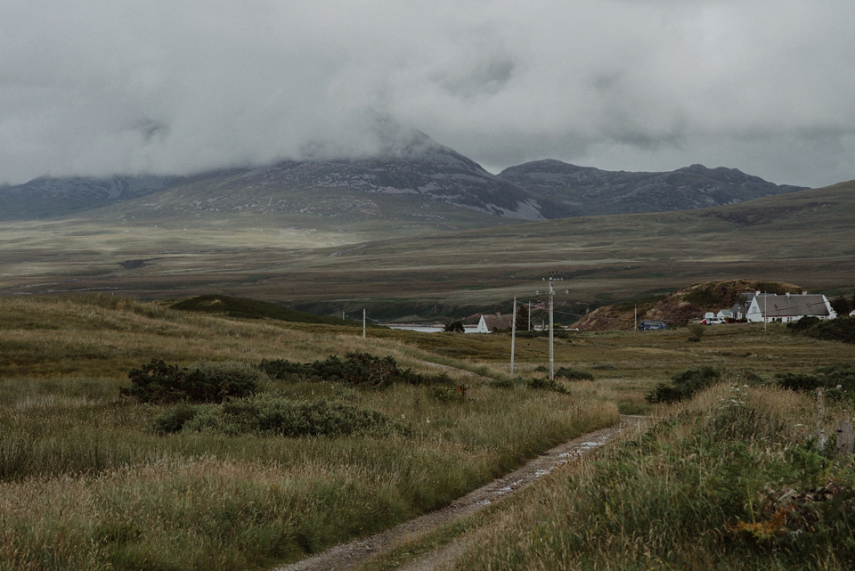 An heirloom wedding dress for an atmospheric and intimate elopement on the Isle of Islay. Photography by The Kitcheners.