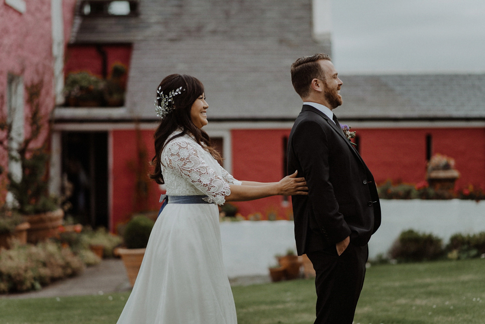 An heirloom wedding dress for an atmospheric and intimate elopement on the Isle of Islay. Photography by The Kitcheners.