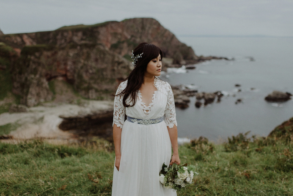 An heirloom wedding dress for an atmospheric and intimate elopement on the Isle of Islay. Photography by The Kitcheners.