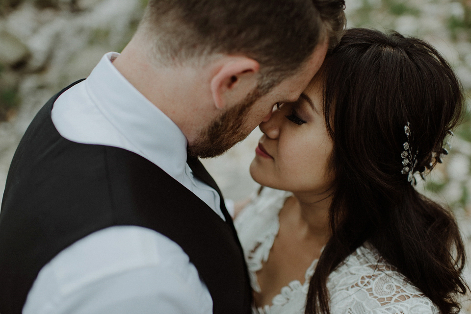 An heirloom wedding dress for an atmospheric and intimate elopement on the Isle of Islay. Photography by The Kitcheners.