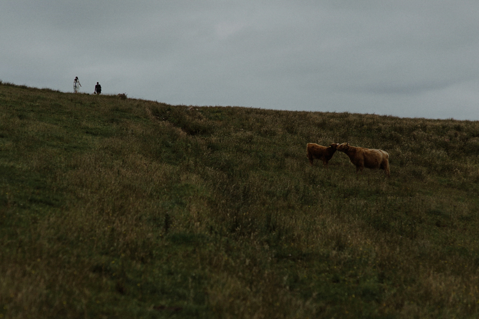 An heirloom wedding dress for an atmospheric and intimate elopement on the Isle of Islay. Photography by The Kitcheners.