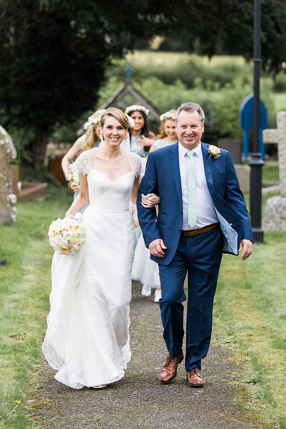 Nicole wearsa Stephanie Allin gown for her seafoam green inspired Summer wedding at Peterstone Court. Film photography by Victoria Phipps.