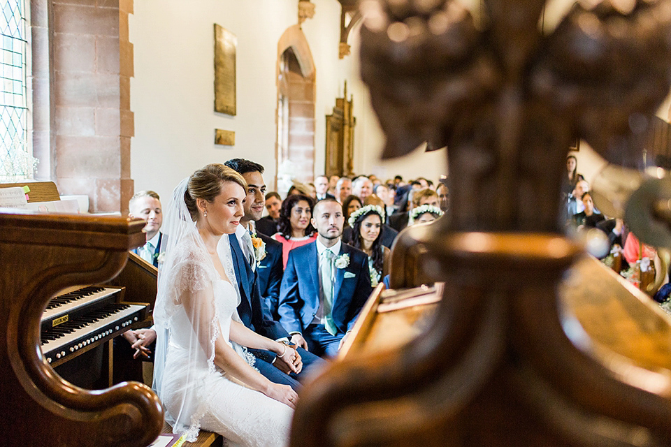 Nicole wearsa Stephanie Allin gown for her seafoam green inspired Summer wedding at Peterstone Court. Film photography by Victoria Phipps.