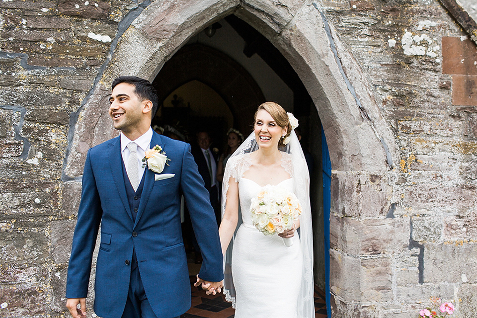 Nicole wearsa Stephanie Allin gown for her seafoam green inspired Summer wedding at Peterstone Court. Film photography by Victoria Phipps.