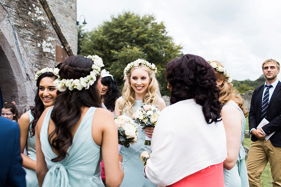 Nicole wearsa Stephanie Allin gown for her seafoam green inspired Summer wedding at Peterstone Court. Film photography by Victoria Phipps.