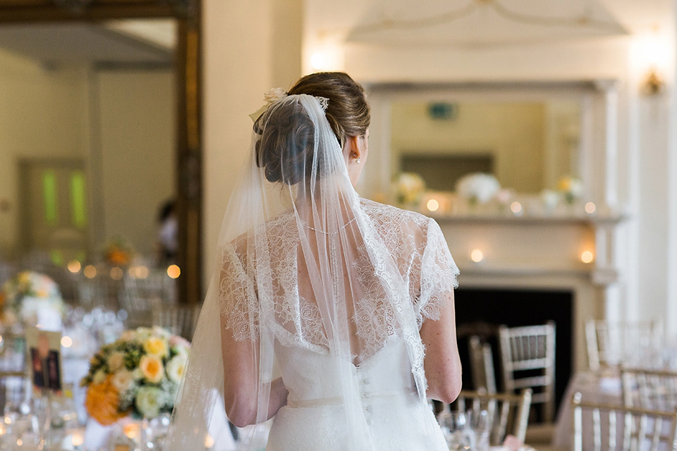 Nicole wearsa Stephanie Allin gown for her seafoam green inspired Summer wedding at Peterstone Court. Film photography by Victoria Phipps.