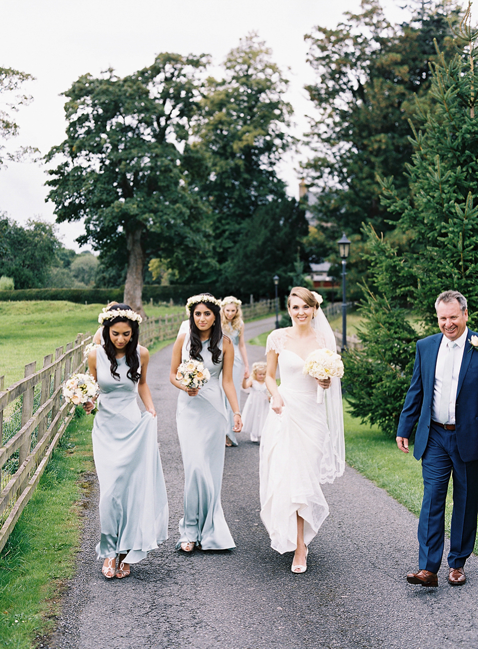 Nicole wearsa Stephanie Allin gown for her seafoam green inspired Summer wedding at Peterstone Court. Film photography by Victoria Phipps.