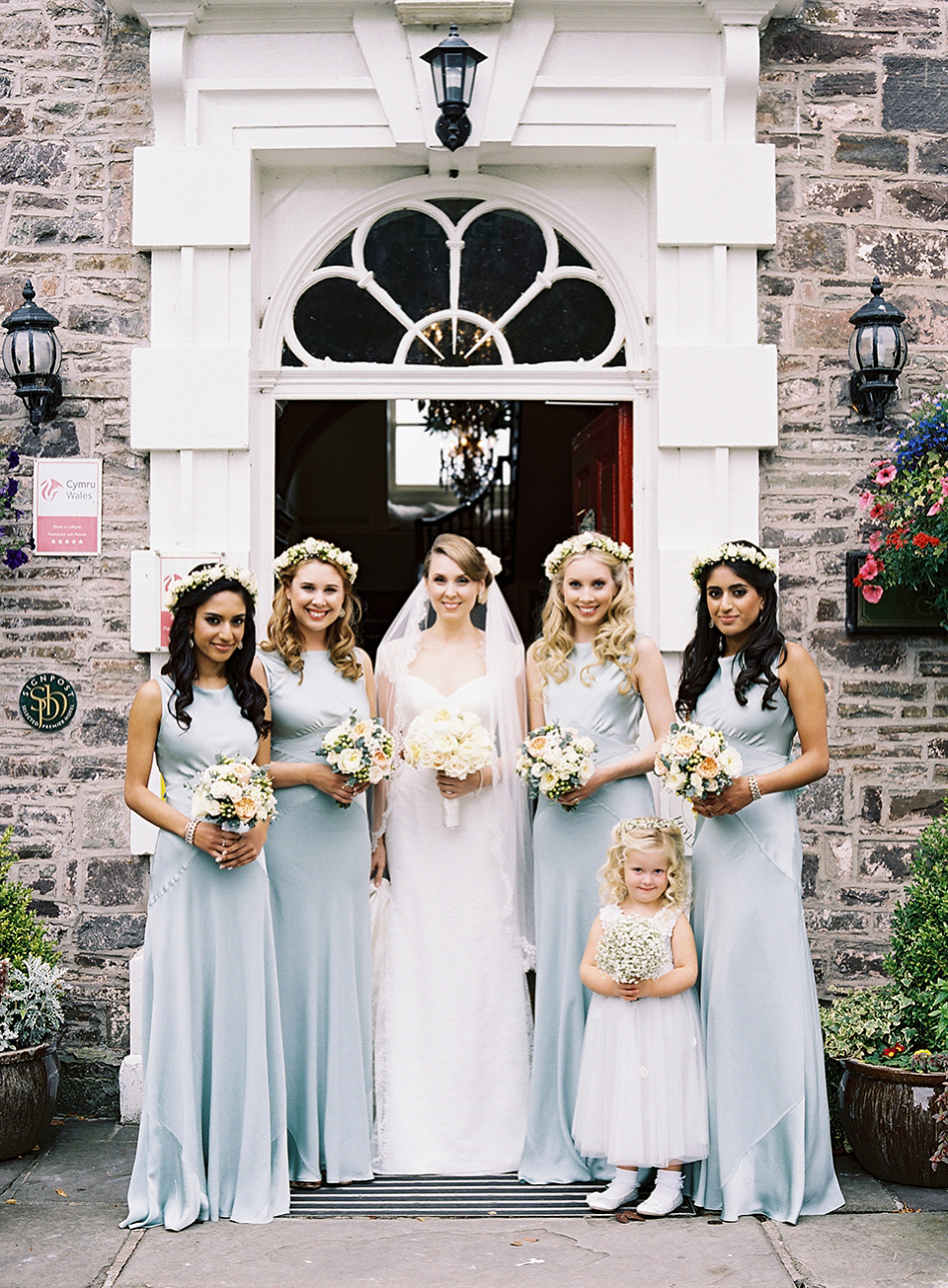 Nicole wearsa Stephanie Allin gown for her seafoam green inspired Summer wedding at Peterstone Court. Film photography by Victoria Phipps.